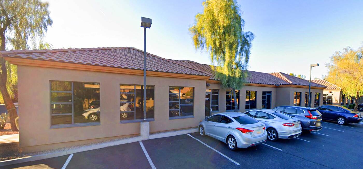 Office building and parking area within the OneSource Tempe complex